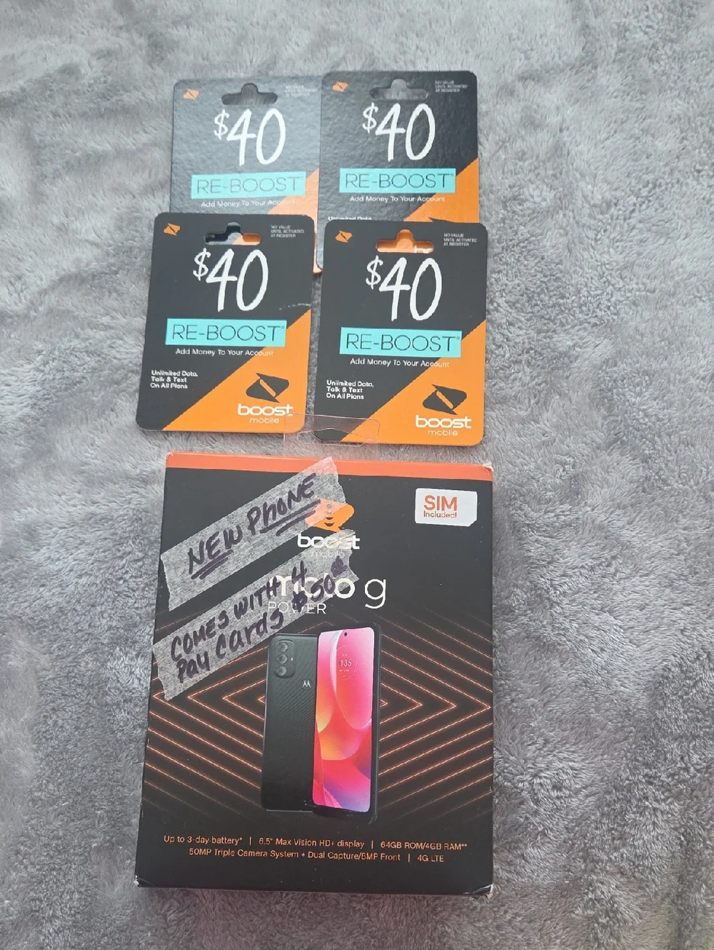 Motorola Smartphone with Orange & Black Packaging